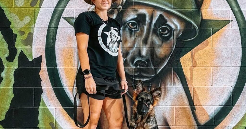 Professional dog trainer working with puppies at Master of Puppies 
daycare facility in Molendinar